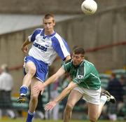 13 June 2004; Andy Hubbard, Waterford, in action against Stephen Lucey, Limerick. Bank of Ireland Munster Senior Football Championship Semi-Final, Limerick v Waterford, Gaelic Grounds, Limerick. Picture credit; Pat Murphy / SPORTSFILE
