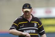 13 June 2004; Kilkenny manager Brian Cody checks his watch towards the end of the game. Guinness Leinster Senior Hurling Championship Semi-Final, Kilkenny v Wexford, Croke Park, Dublin. Picture credit; Brian Lawless / SPORTSFILE