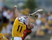 13 June 2004; Colm McGuickian, Antrim, in action against Andy Savage, Down. Guinness Ulster Senior Hurling Championship Final Replay, Down v Antrim, Casement Park, Belfast. Picture credit; David Maher / SPORTSFILE
