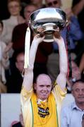 13 June 2004; Colm McGuickian, Antrim captain, celebrates with the Cup after victory over Down. Guinness Ulster Senior Hurling Championship Final Replay, Down v Antrim, Casement Park, Belfast. Picture credit; David Maher / SPORTSFILE