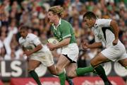 12 June 2004; Brian O'Driscoll, Ireland, in action against Fourie Du Preez, South Africa. South Africa Tour June 2004, South Africa v Ireland, Vodacompark, Bloemfontein, Free State, South Africa. Picture credit; Matt Browne / SPORTSFILE