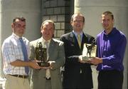 14 June 2004; Carlow footballer Johnny Nevin, left, who was presented with the Vodafone Footballer of the month award for May, Nickey Brennan, Chairman of the Leinster Council, Enda Lynch, Vodafone Sponsorship Executive, right, and Waterford hurler Dan Shanahan, extreme right, who was presented with the Vodafone Hurler of the Month award for May at a luncheon in the Westin Hotel, Dublin. Picture credit; Pat Murphy / SPORTSFILE
