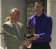 14 June 2004; Dan Shanahan, Waterford, right, is presented with the Vodafone Hurler of the Month award for May by Nickey Brennan, Chairman of the Leinster Council, at a luncheon in the Westin Hotel, Dublin. Picture credit; Pat Murphy / SPORTSFILE