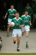 6 June 2004; Fermanagh captain Shane McDermott leads his team out onto the pitch. Bank of Ireland Ulster Senior Football Championship, Tyrone v Fermanagh, St. Tighernach's Park, Clones, Co. Monaghan. Picture credit; Damien Eagers / SPORTSFILE