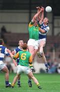 7 July 1997; John McDermott, Meath, contests a high ball with Tony Maher, Laois, as Tom Bowe (13) and Ian Fitzgerald, Laois and Enda McManus, Meath (6) await the dropping ball. Bank of Ireland Leinster Football Championship, Meath v Laois, Croke Park, Dublin. Picture credit; Brendan Moran / SPORTSFILE