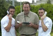 15 June 2004; At the announcement of Cross- Sport, a new telecoms business which is powered by Euphony, are from l to r, Galway footballer Padraic Joyce, Cork footballer Colin Corkery and Tipperary hurler Eoin Kelly. Montrose Hotel, Belfield, Dublin. Picture credit; Damien Eagers / SPORTSFILE