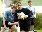 15 June 2004; David Humphreys in action against Malcolm O'Kelly during Ireland rugby squad training. The Villages Rugby Ground, Cape Town, South Africa. Picture credit; Matt Browne / SPORTSFILE