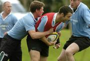 15 June 2004; Kevin Maggs is tackled by Ronan O'Gara, left,  during Ireland rugby squad training. The Villages Rugby Ground, Cape Town, South Africa. Picture credit; Matt Browne / SPORTSFILE