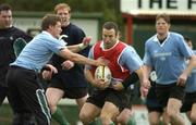 15 June 2004; Kevin Maggs is tackled by Ronan O'Gara, left, during Ireland rugby squad training. The Villages Rugby Ground, Cape Town, South Africa. Picture credit; Matt Browne / SPORTSFILE