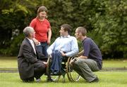 15 June 2004; Members of the Irish athletics team, Lisa Callaghan, Duleek, Co. Meath, John Fulham, Limerick, and Derek Malone, right, Whitegate, Co. Clare, with Liam Moggan, left, Paralympic Athletics team manager, at a photocall in St Stephen's Green, prior to the announcement of the Irish team for the 2004 Athens Paralympic Games at the Fitzwilliam Hotel, Dublin. Picture credit; Brendan Moran / SPORTSFILE