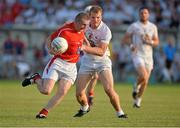 13 July 2013; Ray Finnegan, Louth, in action against Peter Kelly, Kildare. GAA Football All-Ireland Senior Championship, Round 2, Kildare v Louth, St Conleth's Park, Newbridge, Co. Kildare. Picture credit: Barry Cregg / SPORTSFILE Picture credit: Barry Cregg / SPORTSFILE