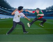 23 August 2013; Nathan Evans, Tyrone, and Matthew Williamson, Mayo, perform a Tyrone and Mayo dance-off in advance of their half-time performance for the One Percent Difference campaign at Sunday’s All-Ireland Championship Semi-Final between Tyrone and Mayo. Sunday’s crowds can expect fancy footwork as 100 dancers will take to the pitch during half time at the All Ireland Championship semi final to re-enforce awareness of the One Percent Difference campaign and call on supporters who believe in their county 100% to give 1% of their time or money to another cause they believe in. For more information visit www.onepercentdifference.ie / @onepercentdiff / # 1Diff. Croke Park, Dublin. Picture credit: Ray McManus / SPORTSFILE