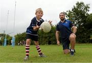23 August 2013; Leinster's Andrew Goodman watches nine year old Darragh Breen, from Enniscorthy, Co. Wexford, in action during a Leinster Rugby Summer Camp at Enniscorthy RFC, Enniscorthy, Co. Wexford. Picture credit: Matt Browne / SPORTSFILE