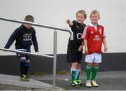 23 August 2013; Camp participants, from left, Patrick Monaghan, age 7, from Dublin, Scott Hickey, age 7, from Boyne, Co. Louth, and Adam Dooley, age 7, from Boyne, Co. Louth, spot Leinster players Jamie Heaslip and Ian Madigan as they arrive at a Leinster Rugby Summer Camp at Clontarf RFC, Clontarf, Co. Dublin. Picture credit: Brian Lawless / SPORTSFILE