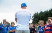 23 August 2013; Leinster's Jamie Heaslip answers questions from camp participants during a Leinster Rugby Summer Camp at Clontarf RFC, Clontarf, Co. Dublin. Picture credit: Brian Lawless / SPORTSFILE