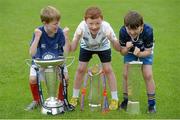 23 August 2013; Camp participants, from left, Liam O'Donovan, age 7, from Clontarf, Conor O'Brien, age 7, from Clarehall, and Andrew Brennan, age 7, from Whitehall, all Dublin, during a Leinster Rugby Summer Camp at Clontarf RFC, Clontarf, Co. Dublin. Picture credit: Brian Lawless / SPORTSFILE