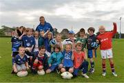 23 August 2013; Leinster players Ian Madigan and Jamie Heaslip with participants at a Leinster Rugby Summer Camp at Clontarf RFC, Clontarf, Co. Dublin. Picture credit: Brian Lawless / SPORTSFILE
