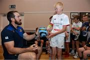 23 August 2013; Leinster's Andrew Goodman signs a ball for eleven year old Killian Creed, from Enniscorthy, Co. Wexford, during a Leinster Rugby Summer Camp at Enniscorthy RFC, Enniscorthy, Co. Wexford. Picture credit: Matt Browne / SPORTSFILE