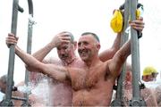 24 August 2013; Noel Browne, right, and Brian O'Regan after completing the 94th Dublin City Liffey Swim. River Liffey, Dublin. Picture credit: Brian Lawless / SPORTSFILE