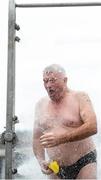 24 August 2013; Last man home Paddy Hoey, Eastern Bay, showers after the 94th Dublin City Liffey Swim. River Liffey, Dublin. Picture credit: Brian Lawless / SPORTSFILE