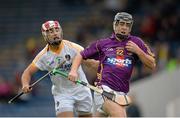 24 August 2013; Aidan Nolan, Wexford, in action against Ciaran Johnson, Antrim. Bord Gáis Energy GAA Hurling Under 21 All-Ireland Championship Semi-Final, Wexford v Antrim, Semple Stadium, Thurles, Co. Tipperary. Picture credit: Stephen McCarthy / SPORTSFILE