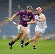24 August 2013; Aidan Nolan, Wexford, in action against Ciaran Johnson, Antrim. Bord Gáis Energy GAA Hurling Under 21 All-Ireland Championship Semi-Final, Wexford v Antrim, Semple Stadium, Thurles, Co. Tipperary. Picture credit: Stephen McCarthy / SPORTSFILE
