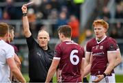 5 March 2023; Referee Conor Lane shows a red card to Peter Cooke of Galway, right, during the Allianz Football League Division 1 match between Galway and Monaghan at Pearse Stadium in Galway. Photo by Seb Daly/Sportsfile