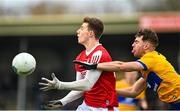 5 March 2023; Conor Corbett of Cork in action against Manus Doherty of Clare during the Allianz Football League Division 2 match between Clare and Cork at Cusack Park in Ennis, Clare. Photo by Eóin Noonan/Sportsfile