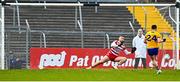 5 March 2023; Keelan Sexton of Clare scores a penalty despite the efforts of Cork goalkeeper Micheál Aodh Martin during the Allianz Football League Division 2 match between Clare and Cork at Cusack Park in Ennis, Clare. Photo by Eóin Noonan/Sportsfile