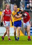 5 March 2023; Pearse Lillis of Clare tussles with Matty Taylor of Cork during the Allianz Football League Division 2 match between Clare and Cork at Cusack Park in Ennis, Clare. Photo by Eóin Noonan/Sportsfile