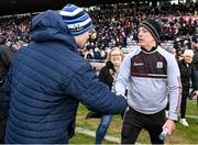 5 March 2023; Galway manager Pádraic Joyce, right, and Monaghan manager Vinnie Corey shake hands after the Allianz Football League Division 1 match between Galway and Monaghan at Pearse Stadium in Galway. Photo by Seb Daly/Sportsfile