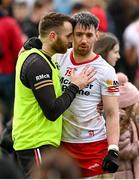 5 March 2023; Matthew Donnelly of Tyrone is congratulated by Ronan McNamee, left, after the Allianz Football League Division 1 match between Tyrone and Kerry at O'Neill's Healy Park in Omagh, Tyrone. Photo by Ramsey Cardy/Sportsfile