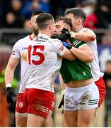 5 March 2023; Dara Moynihan of Kerry tussles with Darragh Canavan, 15, and Matthew Donnelly of Tyrone during the Allianz Football League Division 1 match between Tyrone and Kerry at O'Neill's Healy Park in Omagh, Tyrone. Photo by Ramsey Cardy/Sportsfile