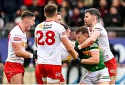 5 March 2023; Dara Moynihan of Kerry tussles with Darragh Canavan and Matthew Donnelly of Tyrone during the Allianz Football League Division 1 match between Tyrone and Kerry at O'Neill's Healy Park in Omagh, Tyrone. Photo by Ramsey Cardy/Sportsfile