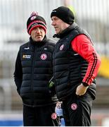 5 March 2023; Tyrone joint-managers Brian Dooher, left, and Feargal Logan during the Allianz Football League Division 1 match between Tyrone and Kerry at O'Neill's Healy Park in Omagh, Tyrone. Photo by Ramsey Cardy/Sportsfile