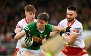 5 March 2023; David Clifford of Kerry is tackled by Conor Meyler, left, and Padraig Hampsey of Tyrone during the Allianz Football League Division 1 match between Tyrone and Kerry at O'Neill's Healy Park in Omagh, Tyrone. Photo by Ramsey Cardy/Sportsfile