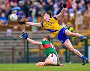 5 March 2023; Brian Stack of Roscommon in action against Jack Carney of Mayo during the Allianz Football League Division 1 match between Roscommon and Mayo at Dr Hyde Park in Roscommon. Photo by Piaras Ó Mídheach/Sportsfile