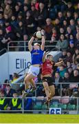 5 March 2023; Padraig Faulkner of Cavan in action against Donagh McAleenan of Down during the Allianz Football League Division 3 match between Cavan and Down at Kingspan Breffni in Cavan. Photo by Stephen Marken/Sportsfile