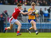5 March 2023; Dermot Coughlan of Clare is tackled by Tommy Walsh of Cork during the Allianz Football League Division 2 match between Clare and Cork at Cusack Park in Ennis, Clare. Photo by Eóin Noonan/Sportsfile