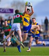 5 March 2023; Richard Hughes of Roscommon in action against Fionn McDonagh of Mayo during the Allianz Football League Division 1 match between Roscommon and Mayo at Dr Hyde Park in Roscommon. Photo by Piaras Ó Mídheach/Sportsfile