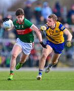 5 March 2023; Sam Callinan of Mayo in action against Colin Walsh of Roscommon during the Allianz Football League Division 1 match between Roscommon and Mayo at Dr Hyde Park in Roscommon. Photo by Piaras Ó Mídheach/Sportsfile