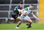 5 March 2023; Brian Fanning of Limerick in action against Donal Lenihan of Meath during the Allianz Football League Division 2 match between Limerick and Meath at TUS Gaelic Grounds in Limerick. Photo by Tyler Miller/Sportsfile