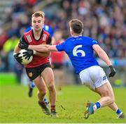 5 March 2023; Donagh McAleenan of Down in action against Dara McVeety of Cavan during the Allianz Football League Division 3 match between Cavan and Down at Kingspan Breffni in Cavan. Photo by Stephen Marken/Sportsfile