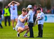 5 March 2023; Kevin O'Callaghan of Kildare signs a jersey for young supporters after the Allianz Football League Division 2 match between Louth and Kildare at Páirc Mhuire in Ardee, Louth. Photo by Ben McShane/Sportsfile