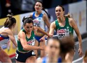 5 March 2023; Phil Healy of Ireland receives the baton from Cliodhna Manning during in the women's 4x400m relay final during Day 3 of the European Indoor Athletics Championships at Ataköy Athletics Arena in Istanbul, Türkiye. Photo by Sam Barnes/Sportsfile