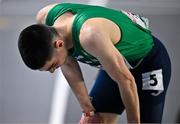 5 March 2023; Darragh McElhinney of Ireland reacts after finishing fourth in the men's 3000m final during Day 3 of the European Indoor Athletics Championships at Ataköy Athletics Arena in Istanbul, Türkiye. Photo by Ramsey Cardy/Sportsfile