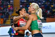5 March 2023; Sarah Lavin of Ireland, right and Ditaji Kambundji of Switzerland embrace after the women's 60m hurdles final during Day 3 of the European Indoor Athletics Championships at Ataköy Athletics Arena in Istanbul, Türkiye. Photo by Sam Barnes/Sportsfile
