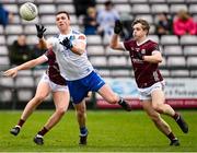 5 March 2023; Killian Lavelle of Monaghan in action against Paul Kelly, left, and Johnny McGrath of Galway during the Allianz Football League Division 1 match between Galway and Monaghan at Pearse Stadium in Galway. Photo by Seb Daly/Sportsfile