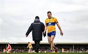 5 March 2023; Ciarán Russell of Clare walks past Clare manager Colm Collins during the Allianz Football League Division 2 match between Clare and Cork at Cusack Park in Ennis, Clare. Photo by Eóin Noonan/Sportsfile