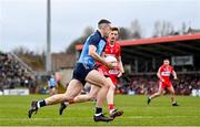 4 March 2023; Brian Fenton of Dublin in action against Brendan Rogers of Derry during the Allianz Football League Division 2 match between Derry and Dublin at Celtic Park in Derry. Photo by Ramsey Cardy/Sportsfile